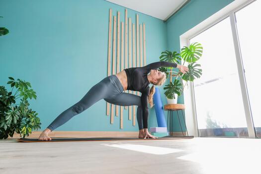 Person practicing gentle morning stretches in a sunlit room